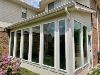 Custom sunroom or screen room by Dynamo Home Improvements
