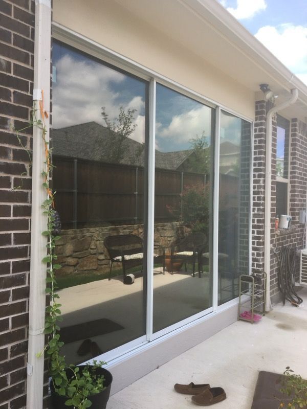 Custom sunroom or screen room by Dynamo Home Improvements