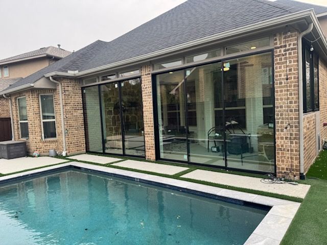Custom sunroom or screen room by Dynamo Home Improvements