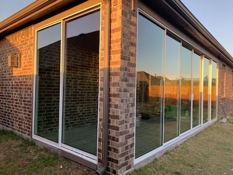 Custom sunroom or screen room by Dynamo Home Improvements