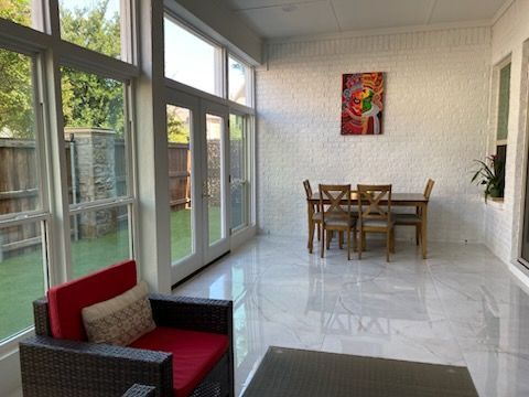 Custom sunroom or screen room by Dynamo Home Improvements