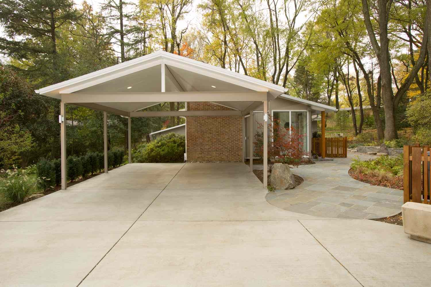 Modern carport structure over a driveway