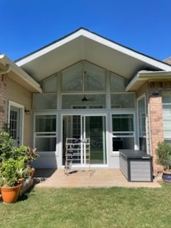 Custom sunroom or screen room by Dynamo Home Improvements