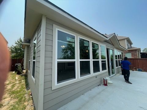 Custom sunroom or screen room by Dynamo Home Improvements