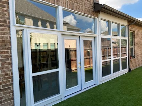 Custom sunroom or screen room by Dynamo Home Improvements