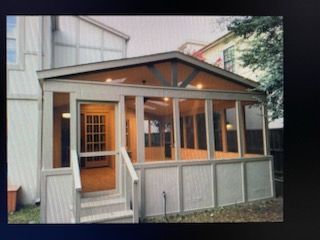 Custom sunroom or screen room by Dynamo Home Improvements