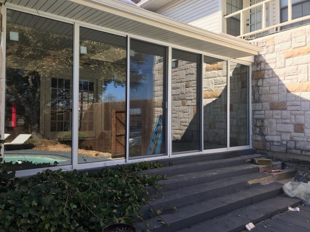 Custom sunroom or screen room by Dynamo Home Improvements