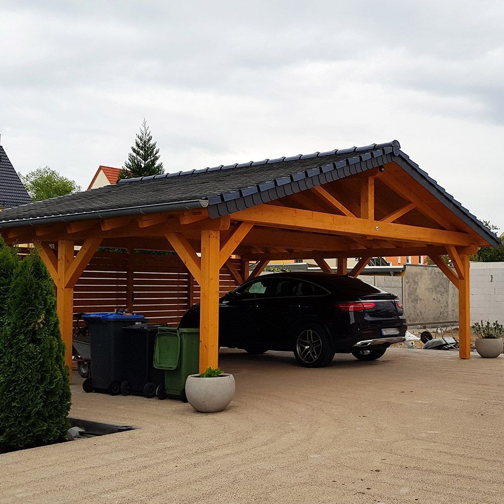 Custom-built wooden carport attached to a modern home